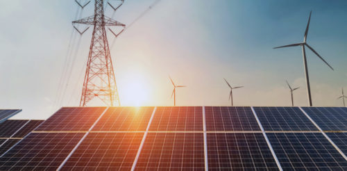 Solar panels with electricity pylon and wind turbine