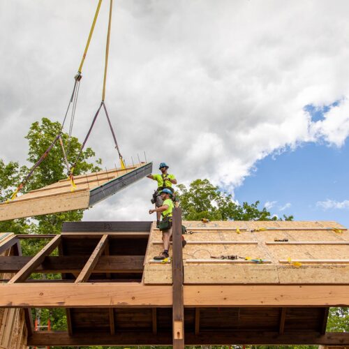 construction workers building a home
